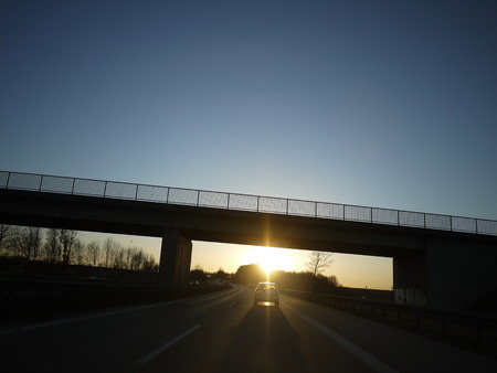 Highway in the evening with a tiny bridge