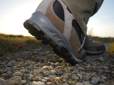 Hiking trail with hiking trekking boots outdoors