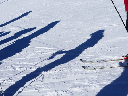 Skiers shadows on snow Allg u Germanyの写真素材