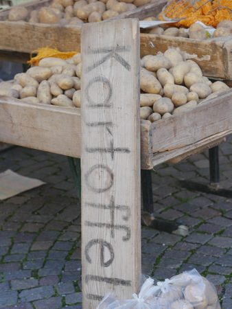 farmers market with organic grown potatoesの写真素材