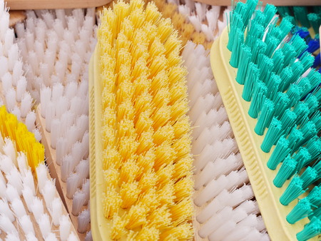 a lot of coloured brushes for cleaning
