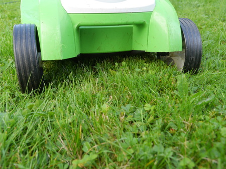 Mowing a lawn with a lawn mower