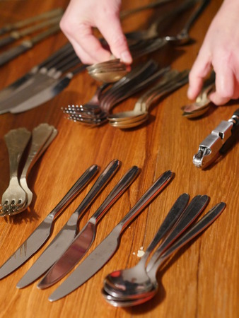 Cutlery set with Fork, Knife and Spoon on a tableの写真素材