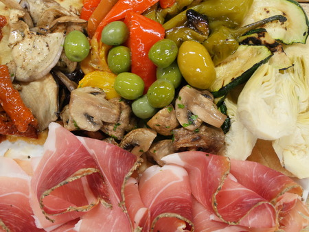 Still life, food and drink, holidays concept. Assortment italian antipasti, jamon, prosciutto, on a plate, Top Viewの写真素材