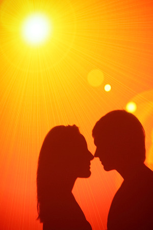 shadows of a loving couple at wall on a discoの写真素材