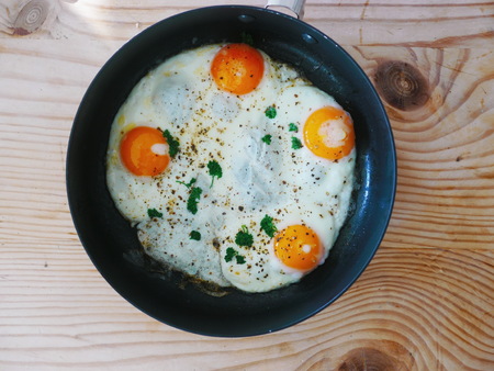 Fried Egg on wooden table