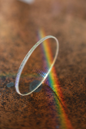 Rainbow is reflected in a glass objectの写真素材