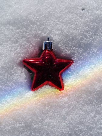 Red star is on top of a white snow