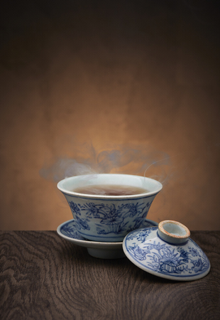Traditional tea ceremony accessories, teacup with wooden backgroundの写真素材