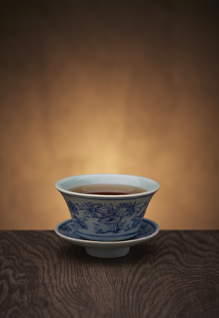 Traditional tea ceremony accessories, teacup with wooden backgroundの写真素材
