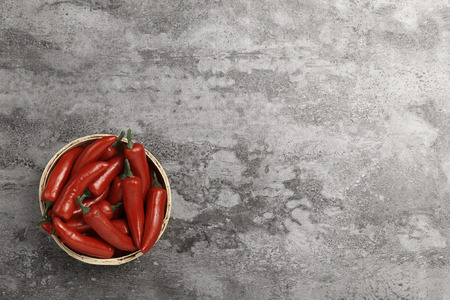 Red chili peppers on the floorの写真素材