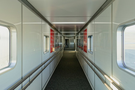From the terminal building to the boarding bridge to the planeのeditorial素材