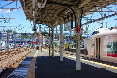 Mito Station where many railroad tracks pass under the blue sky