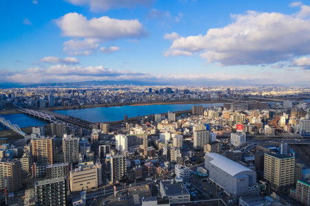 Panoramic view of yodogawa river spreading in the blue sky (from umeda sky building high floor)
