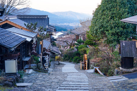 Nakasendo Magome-juku (Nakatsugawa City, Gifu Prefecture) in the early morning with old private houses on the slopeのeditorial素材