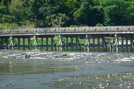 Togetsukyo Bridge (Kyoto City) spanning the Katsura River, which separates Sagano and Arashiyamaの写真素材