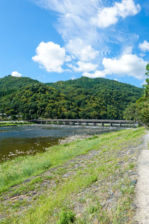 Togetsukyo Bridge (Kyoto City) spanning the Katsura River, which separates Sagano and Arashiyamaの写真素材