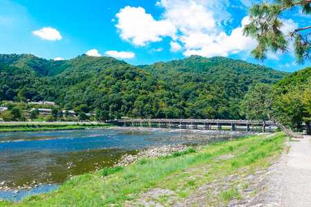 Togetsukyo Bridge (Kyoto City) spanning the Katsura River, which separates Sagano and Arashiyamaの写真素材