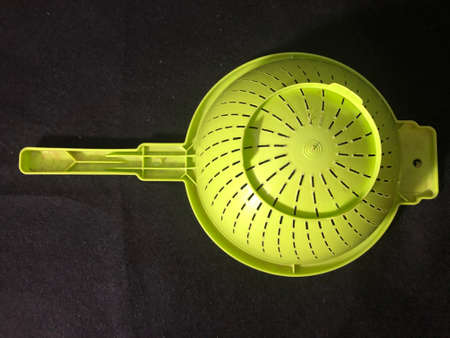 VEGETABLE STRAINER AND POETRY BOOKSの写真素材