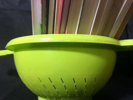 VEGETABLE STRAINER AND POETRY BOOKSの写真素材