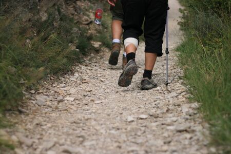 walkers on stone pathの写真素材