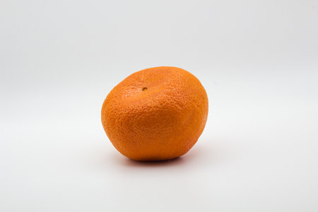 Fresh orange fruit on white backgroundの写真素材