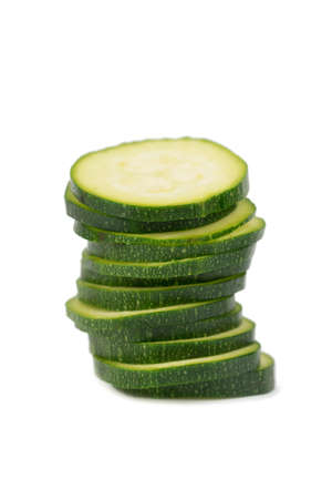 green courgette cut in many slicesの写真素材