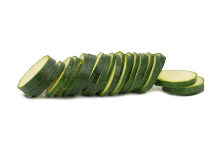 green courgette cut in many slicesの写真素材