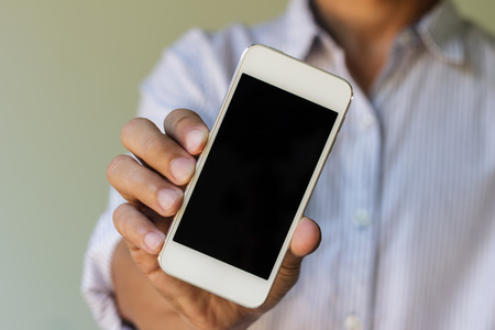 man show his smart phone, smart phone in the handのeditorial素材