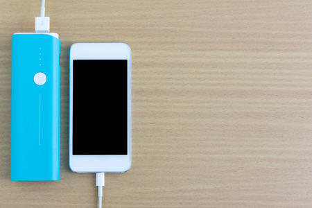 Smartphone is charging with power bank