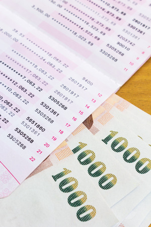 stack of thai banknote and Account Passbookの写真素材