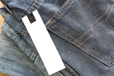 white paper tag with jeans