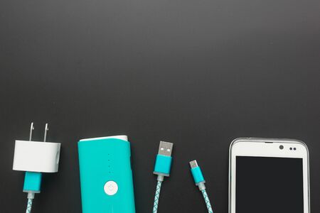 charging cables for smartphone in top view