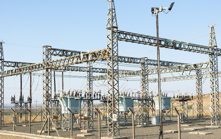 high voltage electric substation with transformers and high voltage power lines