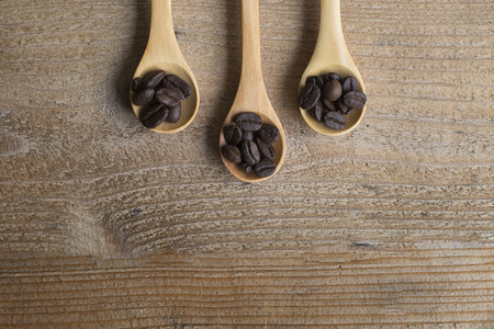 coffee bean Spoon on a wooden tableの写真素材