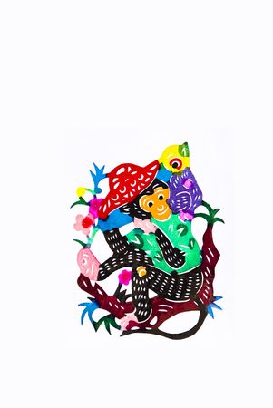 monkey,This is a Chinese paper-cut, reflecting the animal a happy life scenarios.の写真素材