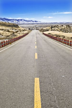 Desert Highway.This is based on China's Qinghai Province, the desert highway.の写真素材