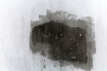 black paint on the wallの写真素材