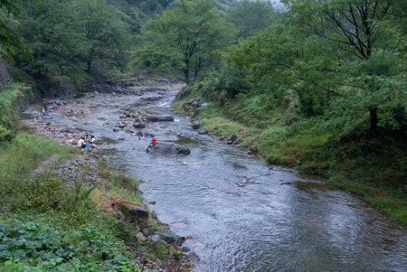 River landscape with people on the riverside.の写真素材