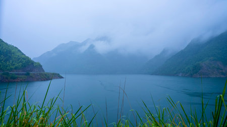 Hazy morning, beautiful view of mountains and lakes, Zhejiang, Chinaの写真素材