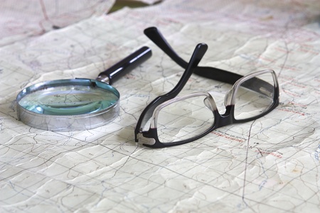 eye glass on the mapの写真素材