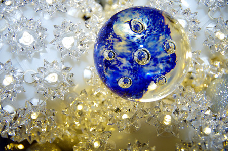 Glass sphere sitting on LED lightsの写真素材