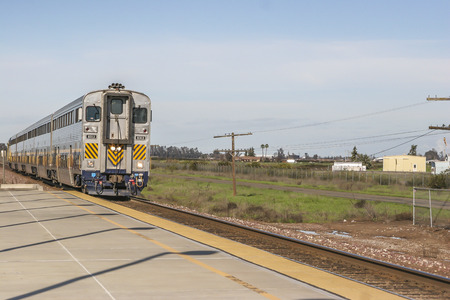 Amtrak Train arriving at Modesto Amtrack Station, Modesto CA. USA.のeditorial素材