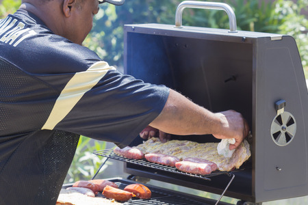 Summer time - Barbecue time a true American tradition that millions will enjoy on holiday or weekend.のeditorial素材