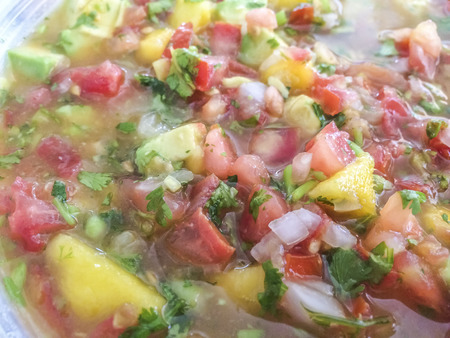 Mango salad combination with tomatoes and avocados, home cooking, vegetables,food, Los Angeles CA. USA.の写真素材