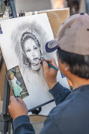 Artist at work, Santa Monica Pier, Santa Monica CA. USA.のeditorial素材