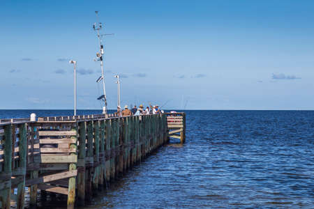 Anglers at Anclote Fisihing Pier, Holiday, FLのeditorial素材