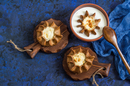Traditional Karelian baking, rye pies wickets (kalitki) with cottage cheese. Diverse national...