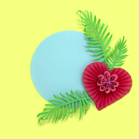 Volumetric heart and leaves of paper on pastel blue circle. Homemade holiday card for Valentine's Day, Women's Day, Mother's Day with space for text. Paper art and paper handicraft. Minimal styleの写真素材