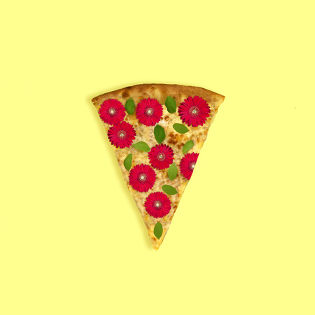 Slice of pizza Margherita with red gerberas instead of tomatoes. Minimal style. Creative idea,...
